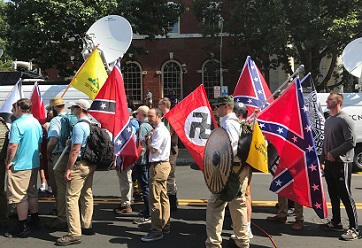 Alt-Right Members with Confederate and Nazi flags, Charlottesville, Sept. 13, 2017. https://commons.wikimedia.org/wiki/File:Charlottesville_%27Unite_the_Right%27_Rally_(35780274914)_crop.jpg